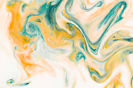 Artistic abstract design created with mixing color liquids. Colorful background texture. Liquids...