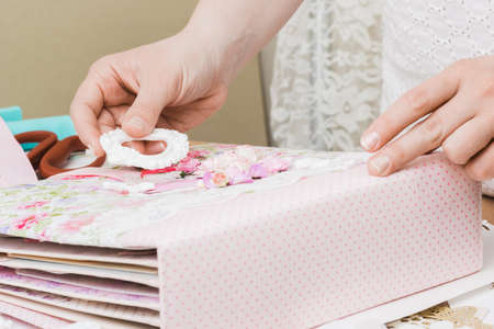 Homemade attributes of happiness (beautiful home production, fabric and paper), the process of creation, handcraft, wedding album. Scrapbooking, diy,の写真素材