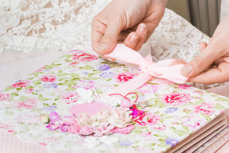 Homemade attributes of happiness (beautiful home production, fabric and paper), the process of creation, handcraft, wedding album. Scrapbooking, diy,の写真素材