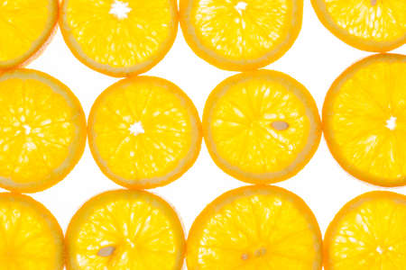 bright orange background of slices of juicy oranges, background imageの写真素材