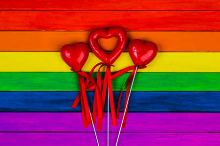 Trims in rainbow colors. Colorful wooden background. gay flag.の写真素材