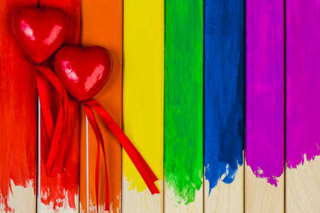 Trims in rainbow colors. Colorful wooden background. gay flag.の写真素材