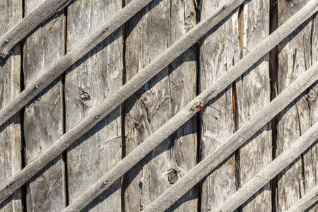 old weathered wooden wall background.の写真素材