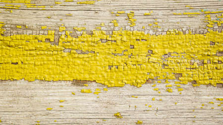 Background image of old yellow wood boards. Texture.の写真素材