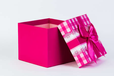 beautiful gift box with a bow on a white background.の写真素材