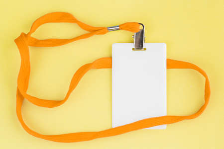Blank card ID / icon with an orange belt on a yellow background. Space for text.