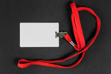 Empty card ID / icon with an orange belt on a black background. Space for text.
