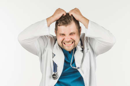 The doctor made a mistake while working. The doctor is in a panic. Emotional expression.