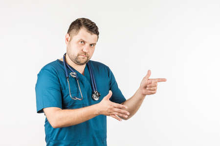 Doctor man showing hand on something. isolated on white backgroundの写真素材
