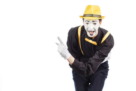 Portrait of a man, an artist, a pantomime. Shows something, isolated on white background