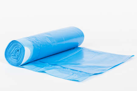 Rolls of disposable trash bags isolated on white backgroundの写真素材