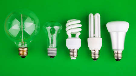 large number of bulbs on a green background.の写真素材