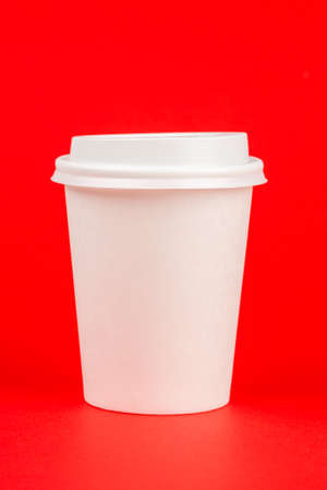 Paper coffee container with white lid. Take-away beverage container. Drink Cup template for your design.の写真素材