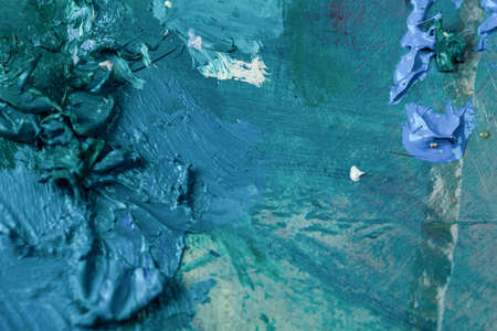 Background image of bright oil-paint palette closeup