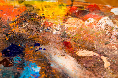 Background image of bright oil-paint palette closeupの写真素材