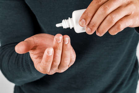 the use of emollient for dry flaky skin, as in the treatment of psoriasis, eczema and other diseases of dry skinの写真素材