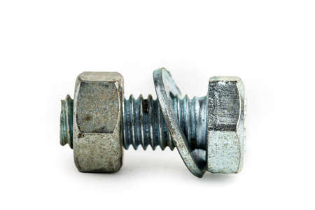 White metal bolt with nut and washer. Instruments conceptの写真素材