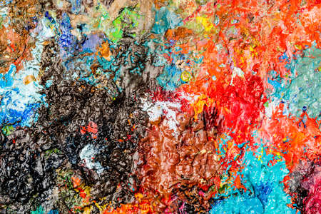 Background image of bright oil-paint palette closeupの写真素材