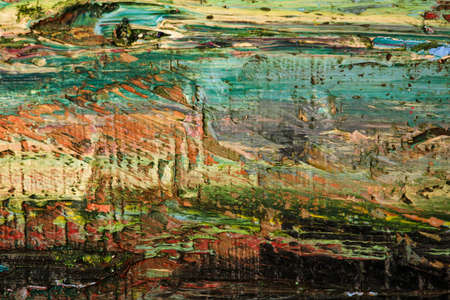 Background image of bright oil-paint palette closeup