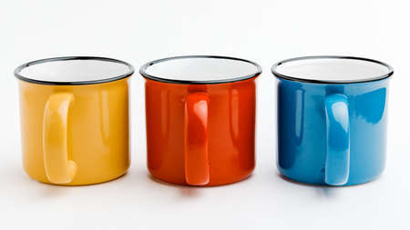 metal mugs on a white isolated background