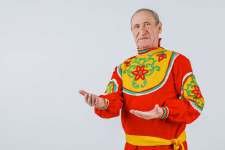 An elderly man in Slavic clothing on a white background.の写真素材