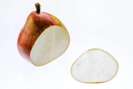 Sliced fresh juicy pears isolated on a white backgroundの写真素材