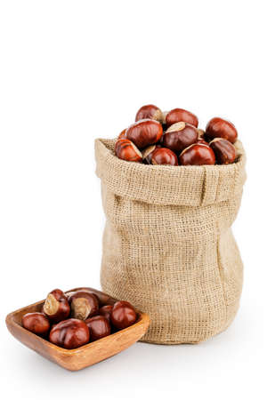 fresh chestnuts in a bag isolated on a white backgroundの写真素材