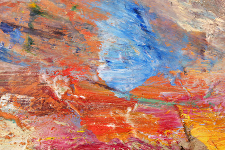 Background image of bright oil-paint palette closeup