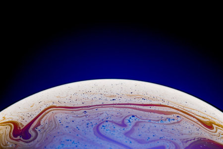 Half of a soap bubble, an abstract semicircle background. The model of the cosmos or the planets.の写真素材