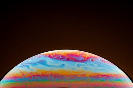 Half of a soap bubble, an abstract semicircle background. The model of the cosmos or the planets.の写真素材