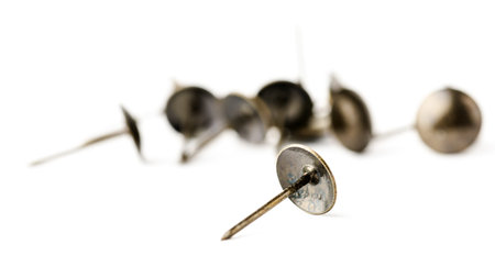 Construction iron nails on a white background