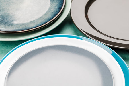 A set of clean dishes and cups. Handmade ceramics, catering, restaurant, healthy food. Space for...