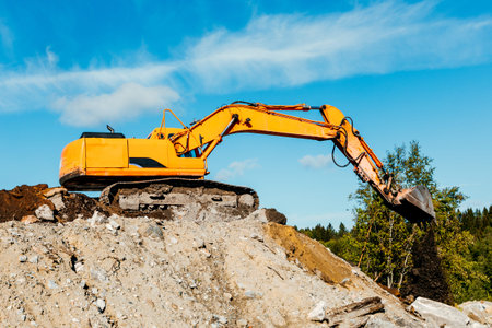 Crawler excavator front view digging on demolition site