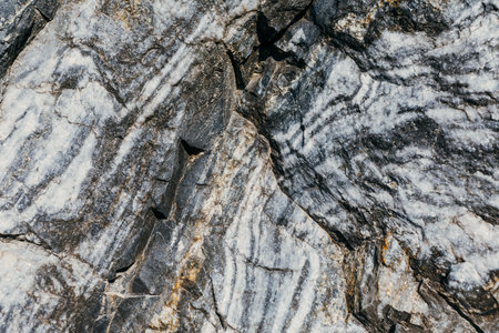 Marble quarry, marble rocks in the wild. natural stone. Ancient marble quarry, marble rocks in the...