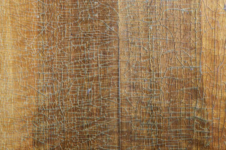old wood board closer texture background with cracked lacquerの写真素材