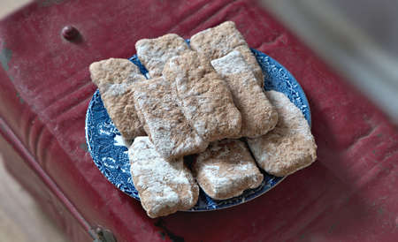 A pile of pita breads on blue plate.の写真素材