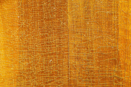 old wood board closer texture background with cracked lacquerの写真素材
