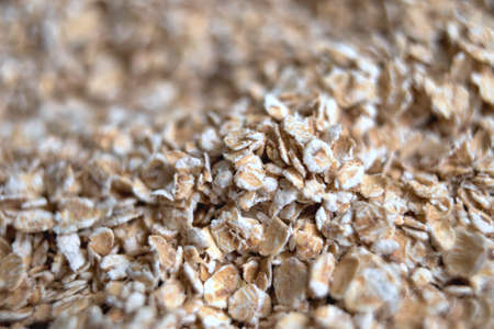 dry rolled pile of oats closeup. Deep blur and bokehの写真素材