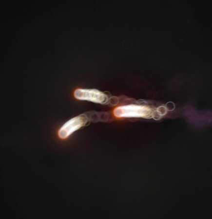 Light blur and defocus bokeh circles like alien parasitesの写真素材