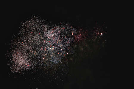 Shiny natural fireworks on dark sky background like cloudの写真素材