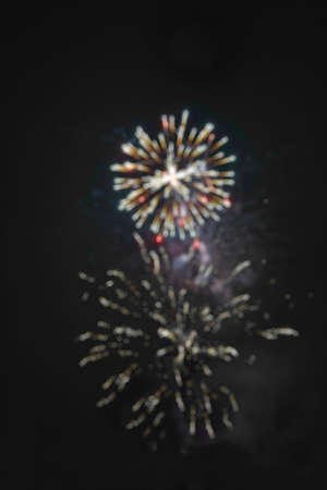 Light blur and defocus bokeh circles on black sky backgroundの写真素材