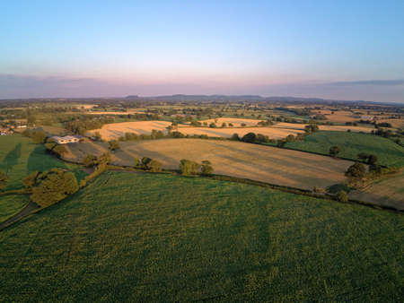 Aerial view on cheshire plains and fields. Summer pink sunsetの写真素材