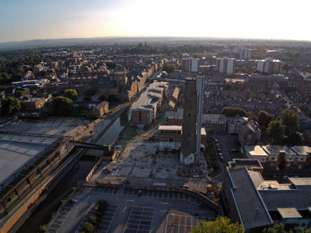 Aerial view, drone panorama of Chester city during sunset, old shot tower and steam mill areaの写真素材