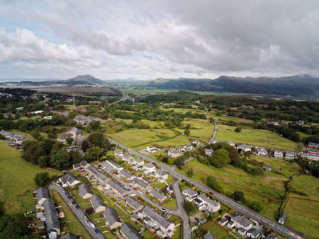 Aerial view, Drone panorama of Penrhyndeudraeth town in Snowdonia mountains in Walesの写真素材