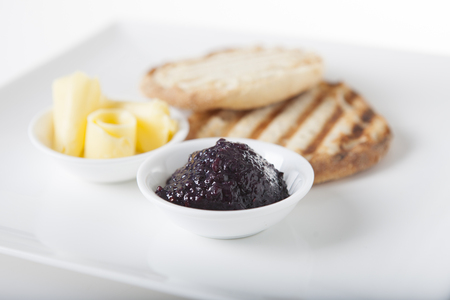 Mulberry jam with toast and butter swirlsの写真素材