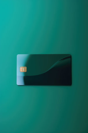 Blank blue credit card with microchip on blue, copy space, created using generative ai technology. Emv chip, banking, spending, technology and finance mock up concept digitally generated image.の素材