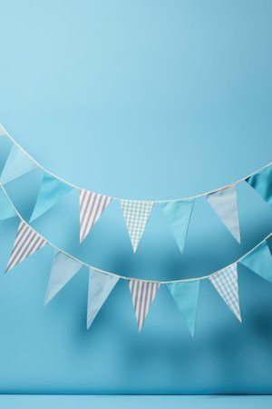 Strings of bunting on blue background, created using generative ai technology. Birthday, party and celebration concept digitally generated image.の素材
