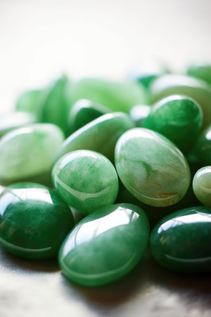 Close up of multiple green and shiny gemstones created using generative ai technology. Nature, minerals and colours concept digitally generated image.の素材