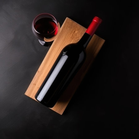 Wine bottle and glass of red wine on black background, created using generative ai technology. Wine week, drink, alcohol and wine tasting awareness concept digitally generated image.の素材