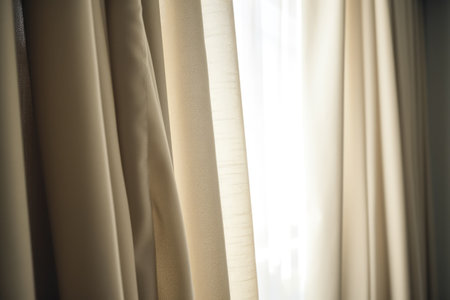 Beige curtains hanging in room with window, created using generative ai technology. Interior design, home decor and fabric concept digitally generated image.の素材